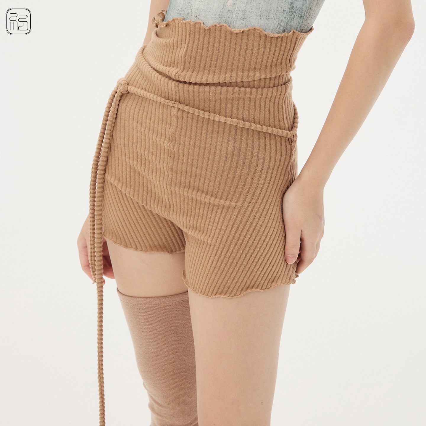 ‘ The Warm ' light weight shorts with extended waist line