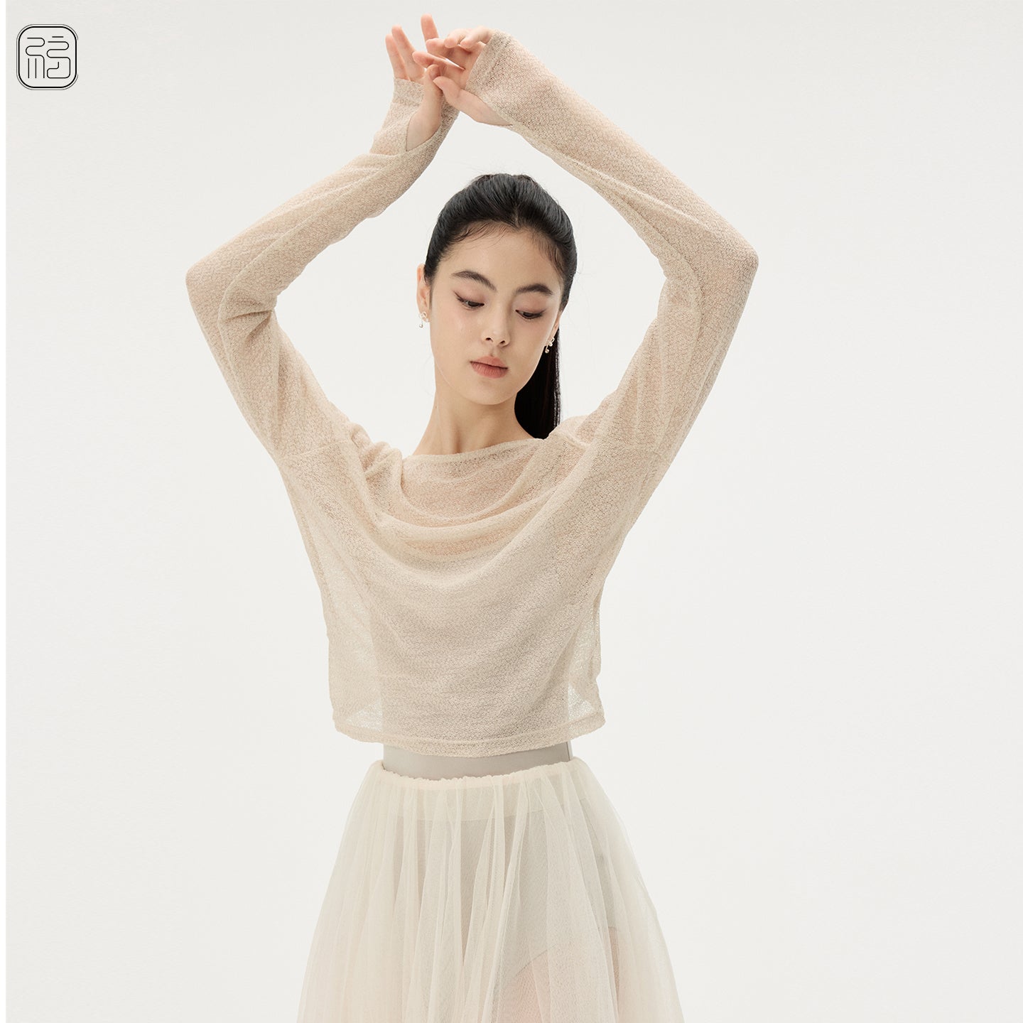 ‘ The Reversible ‘ Knot-front Knitted Top